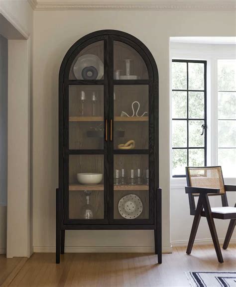 wood arched cabinets with doors